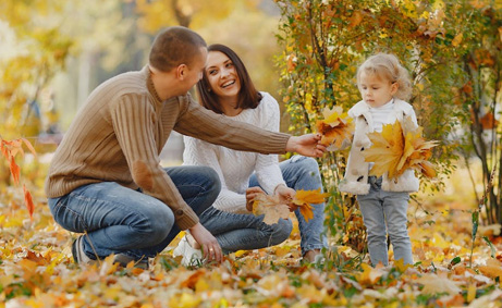 family playing in the park